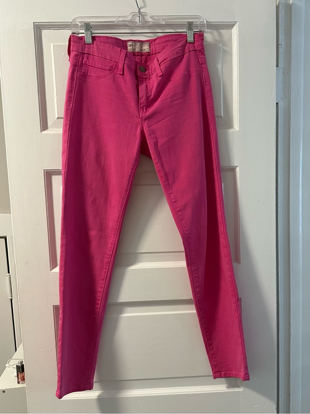 Free people bright pink jeans.